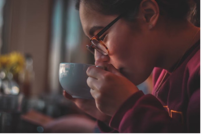 Woman drinking coffee